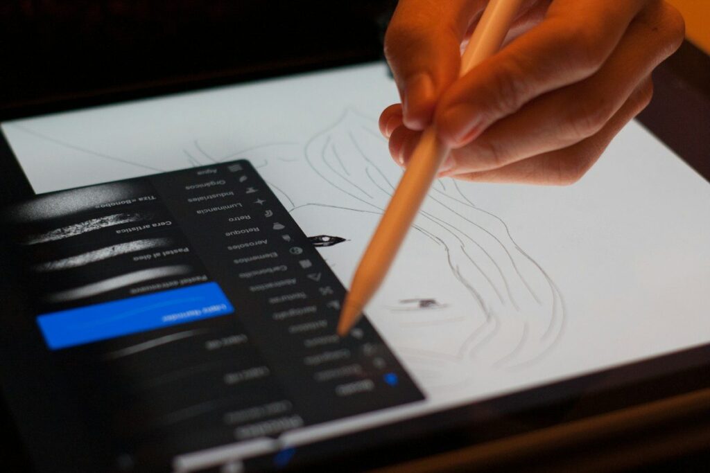 Hand drawing on a tablet with a stylus