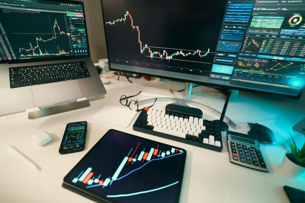 Candlestick chart on a monitor, showing how a price leg slows as you read price action