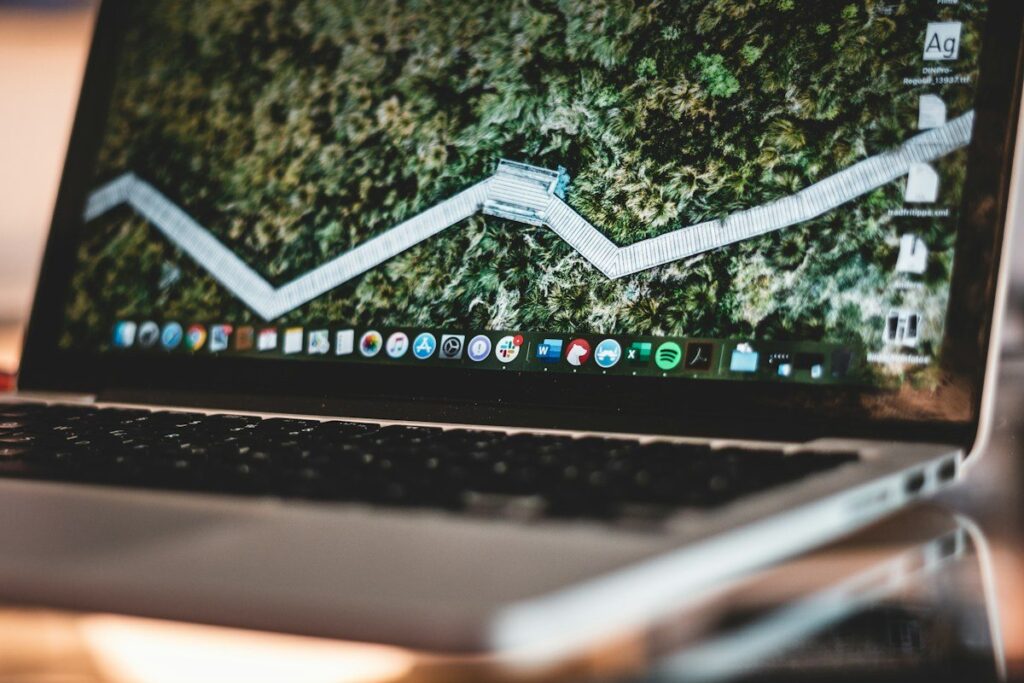Laptop screen showing a simple rising line graph