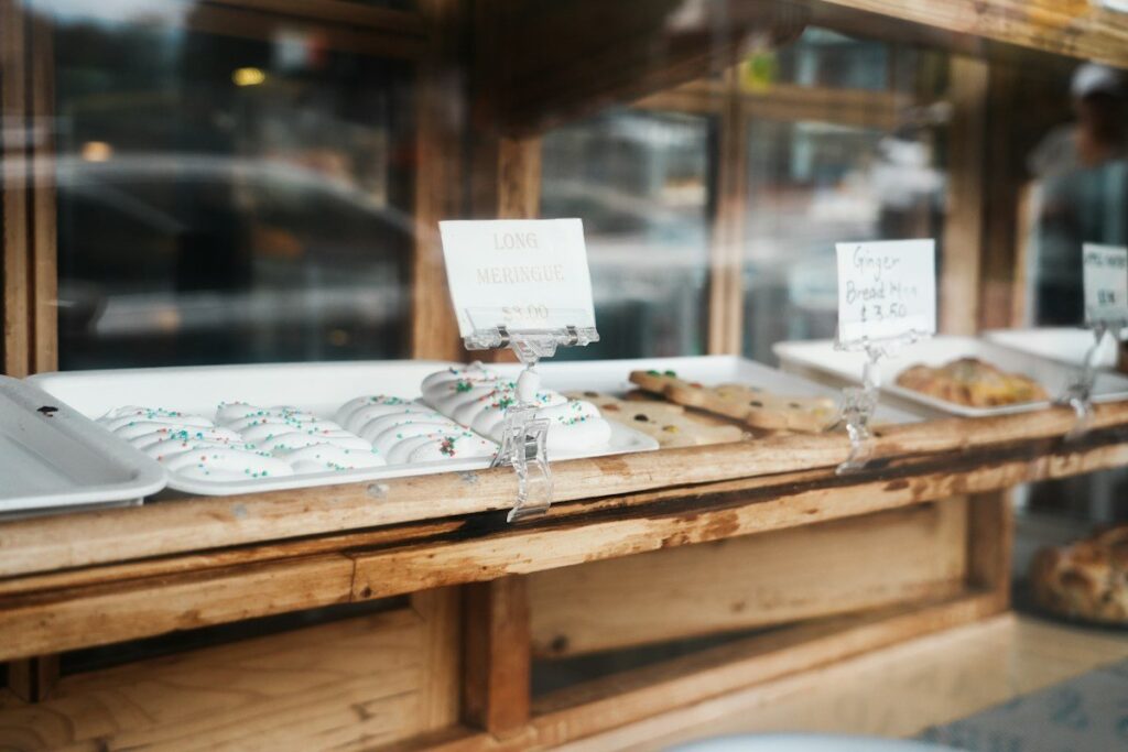 Bakery shelf half emptied by early customers, like waiting orders used up when a zone is tested