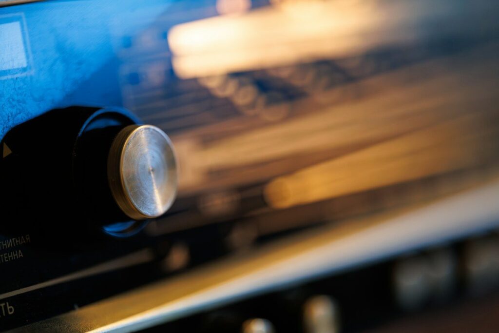 Metal dial on a piece of audio equipment, a picture of adjusting an ATR trail to market volatility