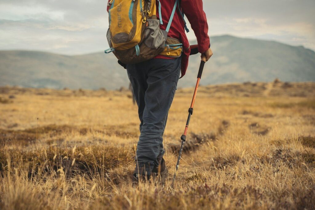 Hiker walking across moorland, like buyers failing twice at the same high in a double top