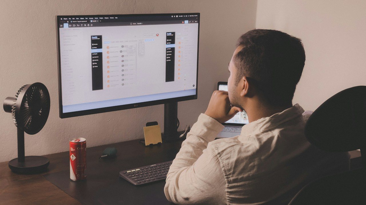 Trader at a home desk studying a trading screen