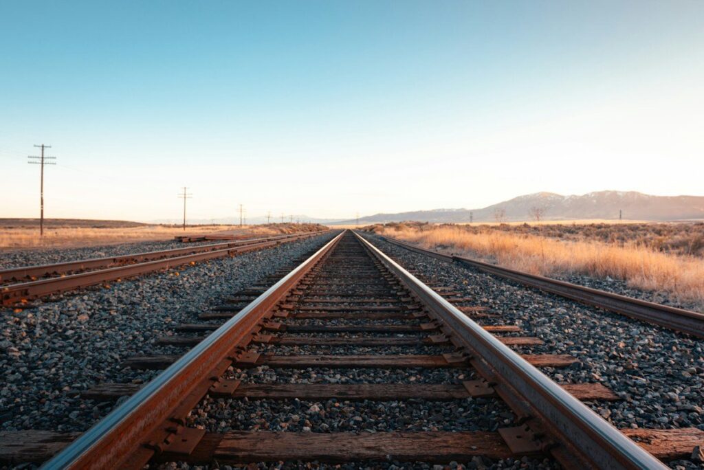 Parallel railway tracks running into the distance, a picture of the two lines of a trend channel