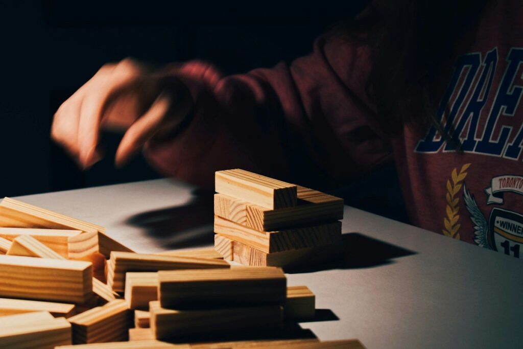 Uneven stacks of wooden blocks, like the rows of a profile that build the value area around the POC