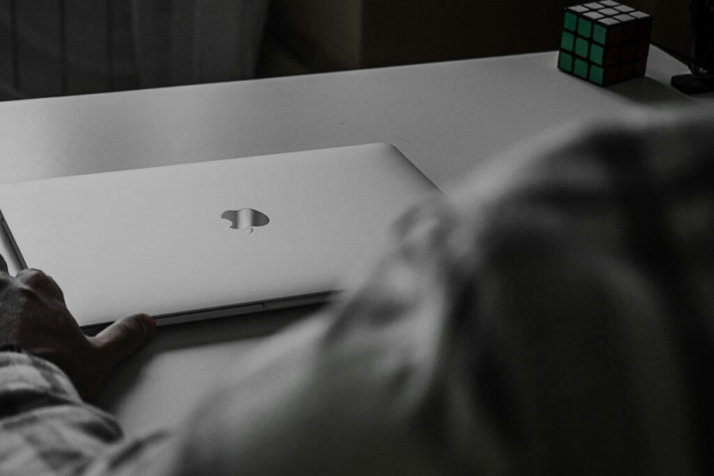 Closed laptop on a desk at the end of the day