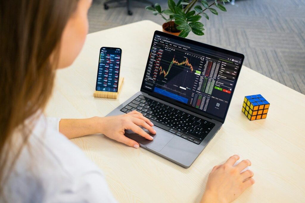 Day trader looking at a candlestick chart