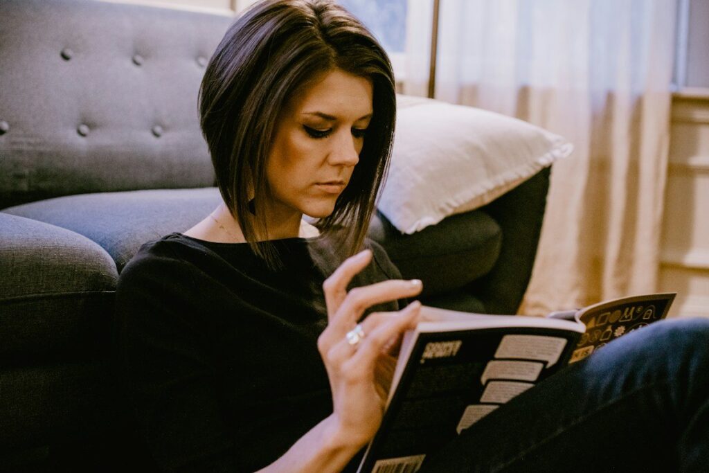 Trader reading a small account plan at home and deciding how much to risk on each trade