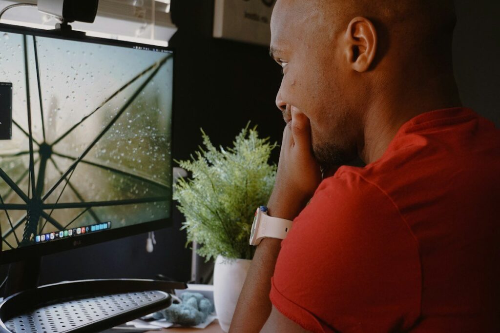 Trader waiting patiently for a defined entry trigger to form at a key price action level