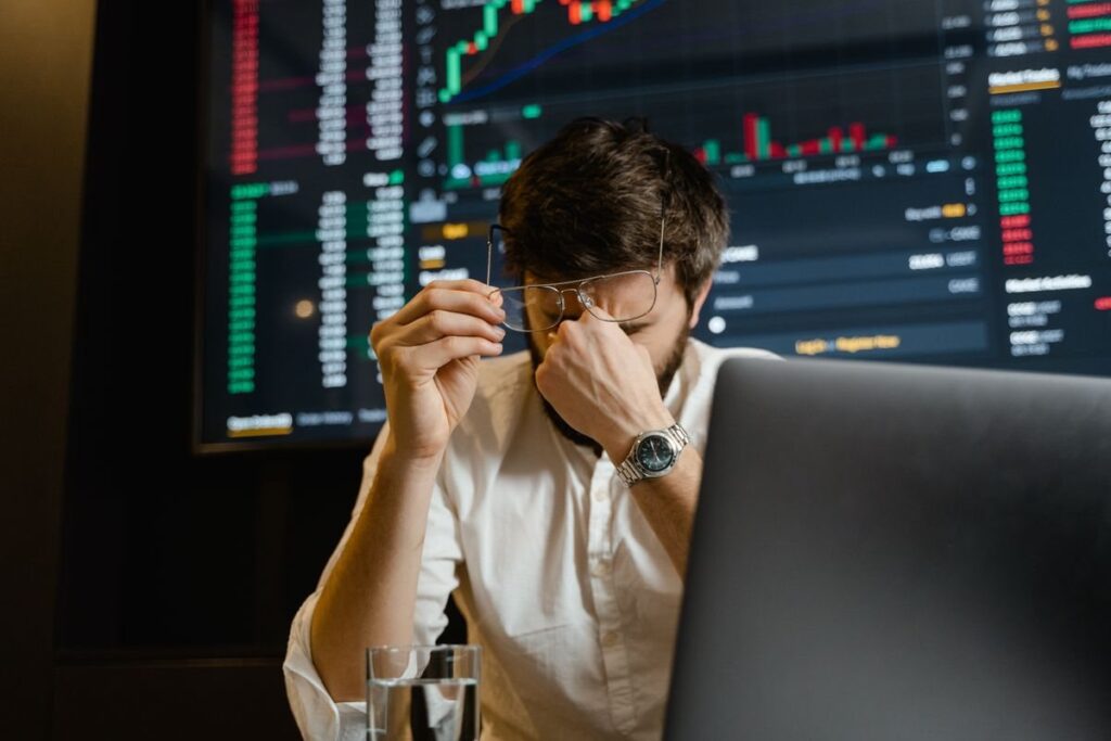 Trader watching a live price chart